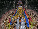 Tibet 06 05 Gyantse Pelkor Chode 11-headed Avalokiteshvara The Pelkor Ch�de Royal Chapel opens on the assembly hall�s right side wall and is dedicated to the 11-headed, 1000-armed image of Avalokiteshvara, considered the patron Bodhisattva of Tibet, the embodiment of compassion. His mantra, Om Mani Padme Hum, is a fundamental part of Buddhist life in Tibet and Nepal.